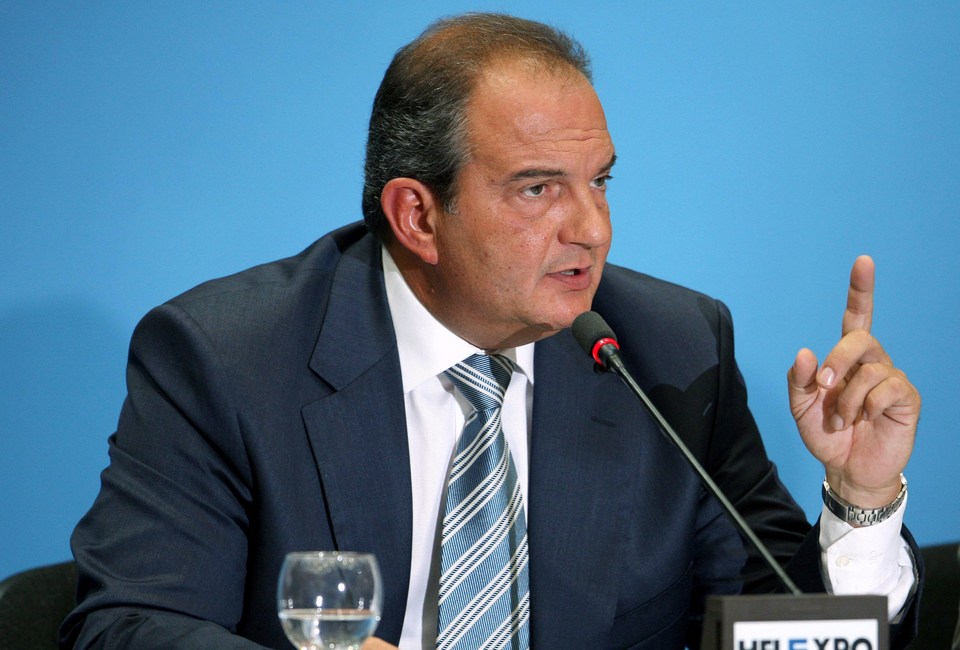 Greek Prime Minister Karamanlis answers a question during a news conference in Thessaloniki